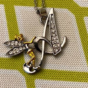 New! “A” initial necklace with fairy motif nesting on letter “A”